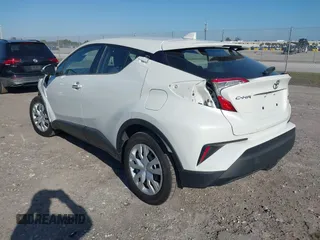 2021 Toyota C-HR LE with VIN NMTKHMBX6MR121247, listed as a IAAI auction lot 41701773 with 57,743 mi miles. Bid and sale history available at carsss.com. Image 3.