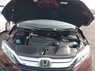 2018 Honda Odyssey EX-L with VIN 5FNRL6H73JB028770, listed as a IAAI auction lot 41984094 with 96,819 mi miles and . Bid and sale history available at DreamBid. Image 10.