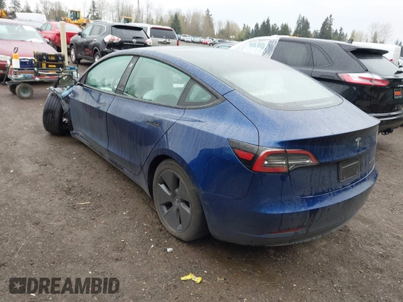 2023 Tesla Model 3 Long Range with VIN 5YJ3E1EB5PF704463, listed as a IAAI auction lot 41916627 with 14,305 mi miles and . Bid and sale history available at DreamBid. Image 3.