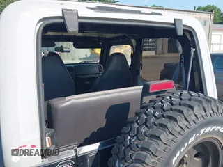2000 Jeep Wrangler SE with VIN 1J4FA29P6YP791344, listed as a IAAI auction lot 42427688 with 184,549 mi miles and . Bid and sale history available at DreamBid. Image 6.