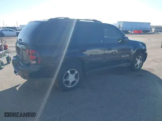 2004 Chevrolet TrailBlazer LS with VIN 1GNDT13S842254665, listed as a IAAI auction lot 40991990 with 279,045 mi miles. Bid and sale history available at carsss.com. Image 4.