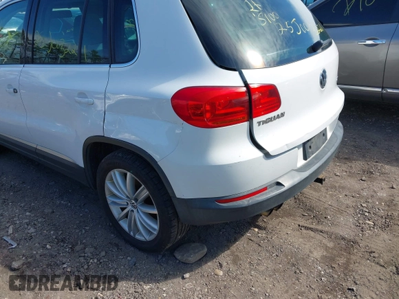 2012 Volkswagen Tiguan S with VIN WVGBV7AX0CW582922, listed as a IAAI auction lot 41906974 with 150,681 mi miles and . Bid and sale history available at DreamBid. Image 6.