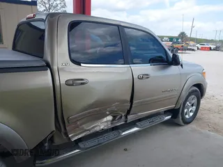 2005 Toyota Tundra SR5 with VIN 5TBET34115S494061, listed as a IAAI auction lot 42307970 with 218,034 mi miles and . Bid and sale history available at DreamBid. Image 6.