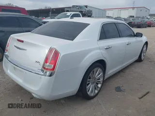 2012 Chrysler 300 with VIN 2C3CCAET1CH253300, listed as a IAAI auction lot 41827997 with 193,298 mi miles. Bid and sale history available at carsss.com. Image 4.