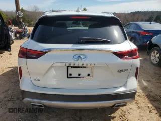 2021 Infiniti QX50 Luxe z VIN 3PCAJ5BB5MF125399, wystawiony jako Copart lot #45708015 z przebiegiem 26 913 mil mil oraz Szkody całkowita. Historia ofert i sprzedaży dostępna na DreamBid. Obrazek 6.