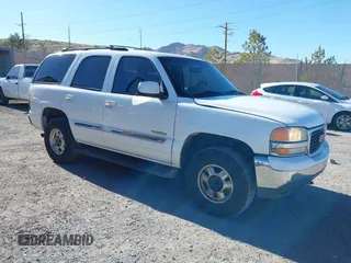 2002 GMC Yukon SLT with VIN 1GKEC13T32R256757, listed as a IAAI auction lot 41657945 with 331,831 mi miles. Bid and sale history available at carsss.com. Image 1.