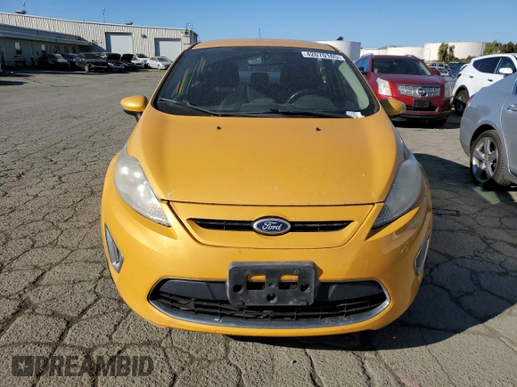 2011 Ford Fiesta SES with VIN 3FADP4FJ6BM124655, listed as a Copart auction lot 42670165 with 112,008 mi miles and Salvage Title. Bid and sale history available at carsss.com. Image 5.
