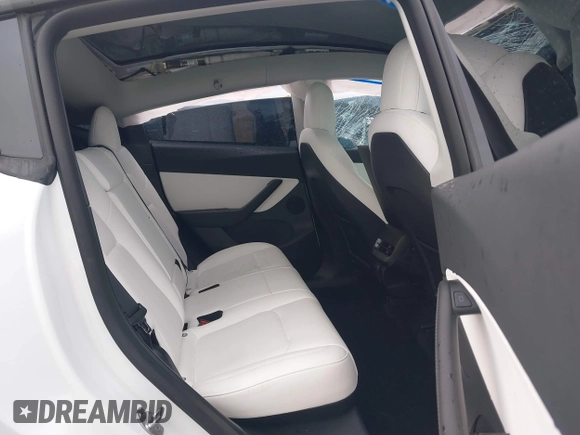 2022 Tesla Model Y Performance with VIN 7SAYGDEF1NF456829, listed as a IAAI auction lot 41448425 with 41,380 mi miles and . Bid and sale history available at DreamBid. Image 8.