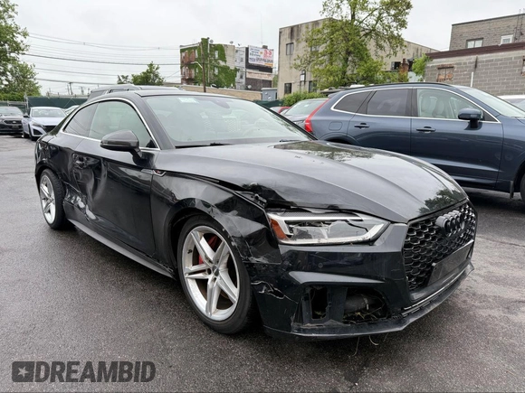 2018 Audi S5 Premium Plus with VIN WAUP4AF59JA077177, listed as a IAAI auction lot 42218794 with 86,654 mi miles and . Bid and sale history available at DreamBid. Image 1.