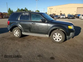 2011 Mazda Tribute Touring with VIN 4F2CY0C70BKM02624, listed as a Copart auction lot 75472464 with 172,077 mi miles and Salvage Title. Bid and sale history available at carsss.com. Image 4.