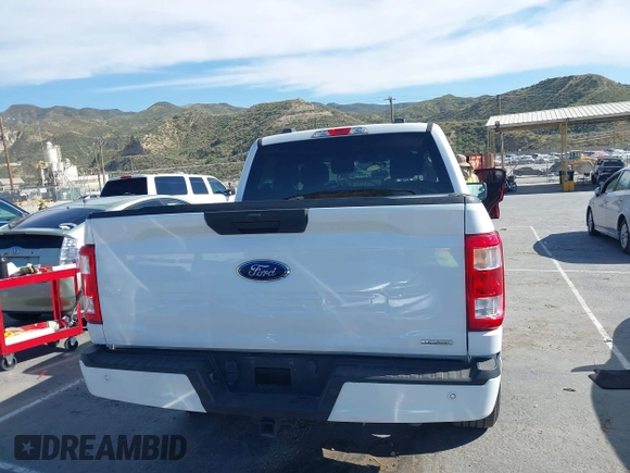 2021 Ford F-150 XL with VIN 1FTEW1CP2MKE42968, listed as a IAAI auction lot 42022454 with 32,908 mi miles. Bid and sale history available at carsss.com. Image 16.