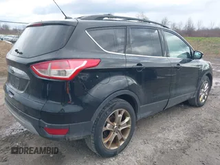 2013 Ford Escape SEL with VIN 1FMCU9HX9DUA69853, listed as a IAAI auction lot 42037021 with 132,166 mi miles and . Bid and sale history available at DreamBid. Image 4.