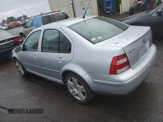 2004 Volkswagen Jetta GL z VIN 3VWRK69M54M030184, wystawiony jako Copart lot #77764124 z przebiegiem 97 634 mil mil oraz Szkoda całkowita • Salvage title. Historia ofert i sprzedaży dostępna na DreamBid. Obrazek 2.