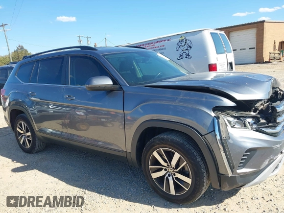 2021 Volkswagen Atlas SE z VIN 1V2DP2CA3MC518670, wystawiony jako IAAI lot #41860811 z przebiegiem 69 270 mil mil oraz . Historia ofert i sprzedaży dostępna na DreamBid. Obrazek 13.