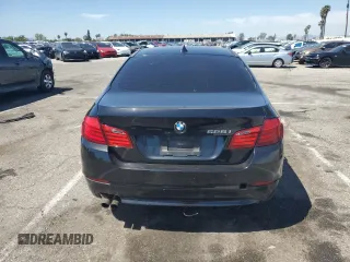 2013 BMW 5 Series 528i with VIN WBAXG5C59DDY35556, listed as a Copart auction lot 52978635 with 101,376 mi miles and Clean Title. Bid and sale history available at carsss.com. Image 6.