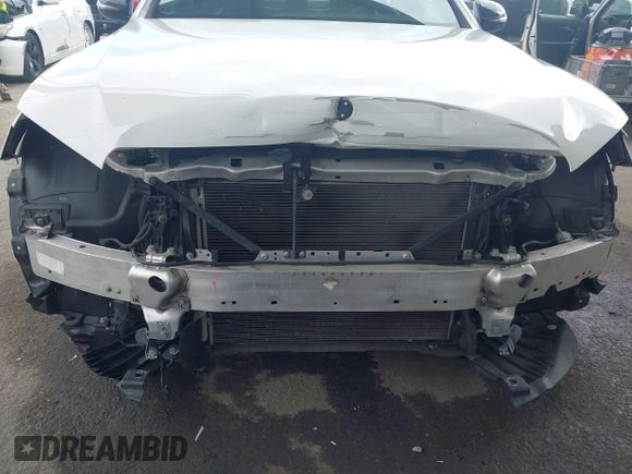 2018 Mercedes-Benz E 300 with VIN WDDZF4JB0JA371240, listed as a IAAI auction lot 42061937 with 66,167 mi miles and . Bid and sale history available at DreamBid. Image 6.