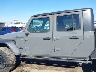 2020 Jeep Gladiator Sport S with VIN 1C6JJTAG6LL190749, listed as a IAAI auction lot 41401209 with 97,292 mi miles and . Bid and sale history available at DreamBid. Image 14.