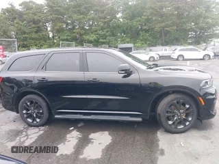 2022 Dodge Durango R/T Plus with VIN 1C4SDJCT8NC187003, listed as a IAAI auction lot 42409749 with 56,055 mi miles and . Bid and sale history available at DreamBid. Image 13.