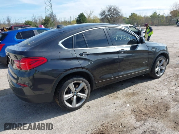 2017 BMW X4 xDrive28i with VIN 5UXXW3C36H0T79679, listed as a IAAI auction lot 42203662 with 137,863 mi miles and . Bid and sale history available at DreamBid. Image 4.