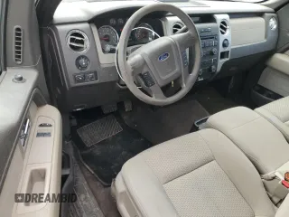 2009 Ford F-150 XL with VIN 1FTPF12V29KC06708, listed as a Copart auction lot 58151755 with 205,682 mi miles and Salvage title. Bid and sale history available at DreamBid. Image 8.