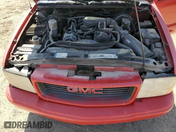 2000 GMC Sonoma SLS z VIN 1GTCS19W0Y8262960, wystawiony jako Copart lot #56512435 z przebiegiem 243 662 mil mil oraz Tytuł czysty. Historia ofert i sprzedaży dostępna na DreamBid. Obrazek 11.