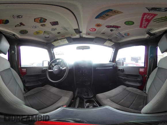 2007 Jeep Wrangler Unlimited Sahara with VIN 1J4GB59197L142223, listed as a IAAI auction lot 42025639 with 155,274 mi miles and . Bid and sale history available at DreamBid. Image 18.