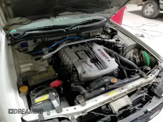 1998 Nissan Skyline z VIN ER34005709, wystawiony jako Copart lot #86591154 z przebiegiem Nie podano mil oraz Szkoda całkowita • Salvage title. Historia ofert i sprzedaży dostępna na DreamBid. Obrazek 12.