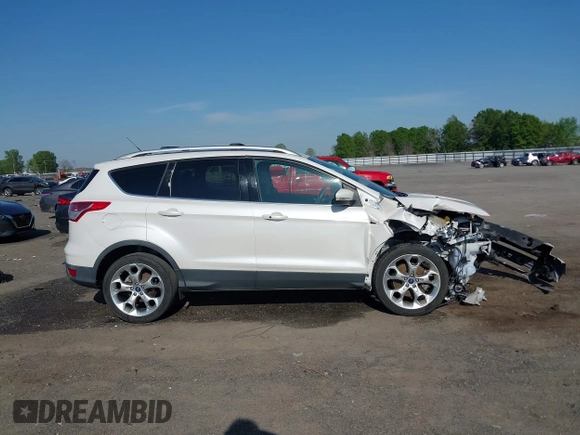 2013 Ford Escape Titanium with VIN 1FMCU0J97DUA70393, listed as a IAAI auction lot 41974106 with 73,548 mi miles and . Bid and sale history available at carsss.com. Image 13.