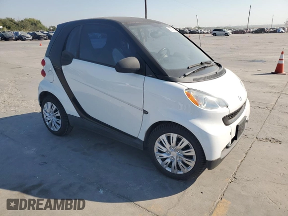 2012 Smart fortwo Pure z VIN WMEEJ3BA5CK540092, wystawiony jako Copart lot #75701964 z przebiegiem 59 355 mil mil oraz Szkody całkowita. Historia ofert i sprzedaży dostępna na DreamBid. Obrazek 4.