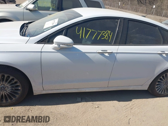 2015 Ford Fusion Titanium with VIN 3FA6P0K90FR282320, listed as a IAAI auction lot 41777384 with 154,204 mi miles. Bid and sale history available at carsss.com. Image 14.