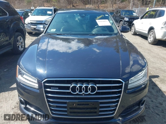 2016 Audi A8 L 4.0T Sport with VIN WAU43AFD1GN022253, listed as a IAAI auction lot 41858053 with 219,517 mi miles. Bid and sale history available at carsss.com. Image 12.