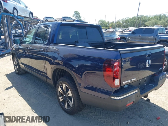 2020 Honda Ridgeline RTL with VIN 5FPYK3F56LB028917, listed as a IAAI auction lot 42280770 with 17,598 mi miles and . Bid and sale history available at DreamBid. Image 3.