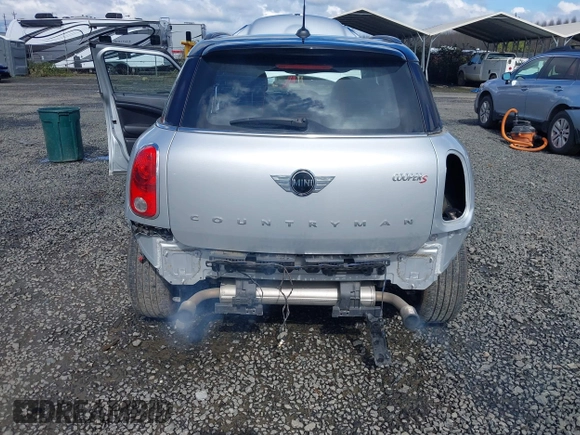 2014 MINI Countryman S with VIN WMWZC3C56EWP26003, listed as a IAAI auction lot 41884630 with 101,683 mi miles and . Bid and sale history available at DreamBid. Image 6.