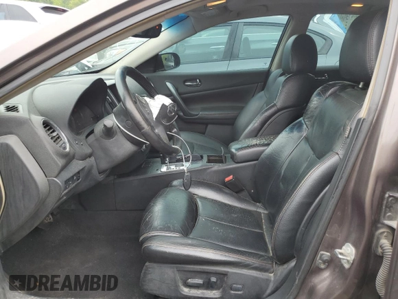 2014 Nissan Maxima SV z VIN 1N4AA5AP6EC439208, wystawiony jako Copart lot #55628955 z przebiegiem 167 773 mil mil oraz Szkoda całkowita • Salvage title. Historia ofert i sprzedaży dostępna na DreamBid. Obrazek 7.