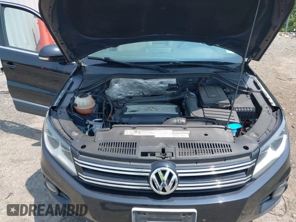 2012 Volkswagen Tiguan SE z VIN WVGBV7AX1CW548133, wystawiony jako IAAI lot #42403164 z przebiegiem 139 083 mil mil oraz . Historia ofert i sprzedaży dostępna na DreamBid. Obrazek 10.