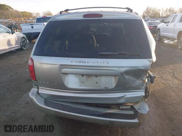 2003 Dodge Grand Caravan with VIN 2D4GP443X3R277421, listed as a IAAI auction lot 41035290 with 243,568 mi miles and . Bid and sale history available at DreamBid. Image 6.