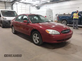 2002 Ford Taurus SES Standard z VIN 1FAFP55U82G148072, wystawiony jako IAAI lot #42033521 z przebiegiem 142 031 mil mil oraz . Historia ofert i sprzedaży dostępna na DreamBid. Obrazek 1.