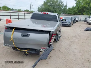 2013 GMC Sierra 1500 SLE z VIN 3GTP1VE09DG302860, wystawiony jako IAAI lot #42031246 z przebiegiem Nie podano mil oraz . Historia ofert i sprzedaży dostępna na DreamBid. Obrazek 4.