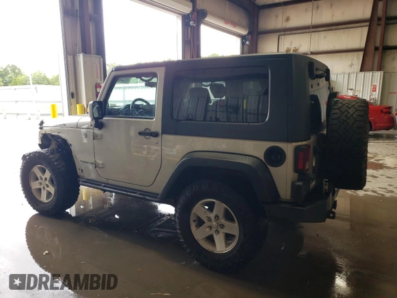 2007 Jeep Wrangler Rubicon z VIN 1J8GA64117L187431, wystawiony jako Copart lot #61293624 z przebiegiem 263 459 mil mil oraz Szkoda całkowita • Salvage title. Historia ofert i sprzedaży dostępna na DreamBid. Obrazek 2.