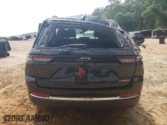 2023 Jeep Grand Cherokee Laredo with VIN 1C4RJGAG0PC534682, listed as a Copart auction lot 56981675 with 16,749 mi miles and Salvage title. Bid and sale history available at DreamBid. Image 6.