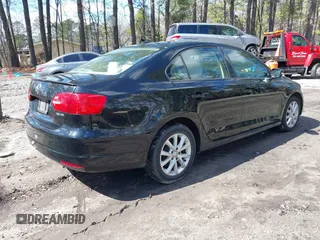 2012 Volkswagen Jetta SE with VIN 3VWDX7AJ5CM351398, listed as a IAAI auction lot 41734647 with 229,671 mi miles and . Bid and sale history available at DreamBid. Image 4.