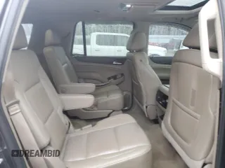 2015 GMC Yukon SLT with VIN 1GKS1BKC9FR278056, listed as a Copart auction lot 44989505 with 205,885 mi miles and Salvage Title. Bid and sale history available at carsss.com. Image 12.