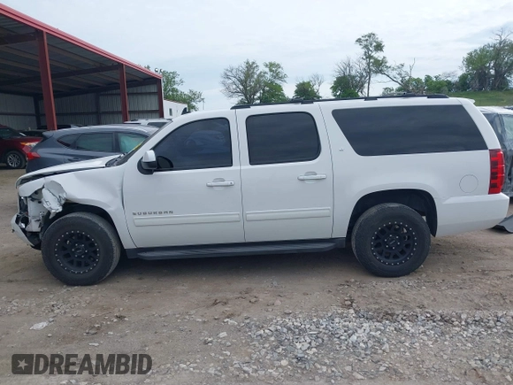 2013 Chevrolet Suburban LT with VIN 1GNSCJE05DR147101, listed as a IAAI auction lot 42336950 with 147,429 mi miles and . Bid and sale history available at DreamBid. Image 15.