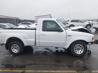 2002 Mazda B-Series 2WD Truck DS with VIN 4F4YR12U82TM11900, listed as a IAAI auction lot 40773356 with 118,353 mi miles. Bid and sale history available at carsss.com. Image 13.