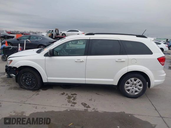 2020 Dodge Journey SE Value with VIN 3C4PDCAB4LT254595, listed as a IAAI auction lot 41572159 with 124,804 mi miles and . Bid and sale history available at carsss.com. Image 15.