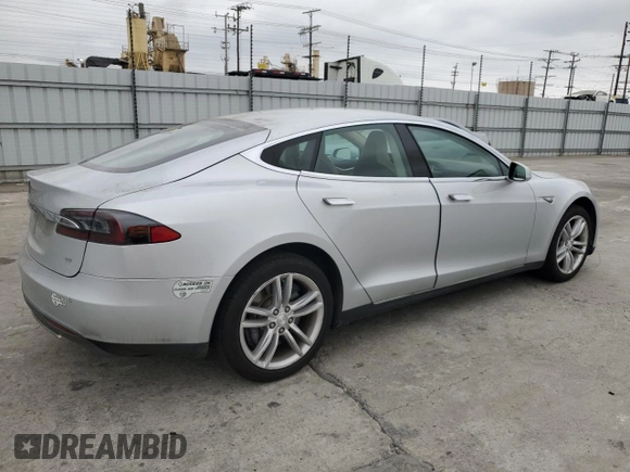 2014 Tesla Model S 60 with VIN 5YJSA1H14EFP34335, listed as a Copart auction lot 65504325 with Not provided miles and Clean title. Bid and sale history available at DreamBid. Image 3.