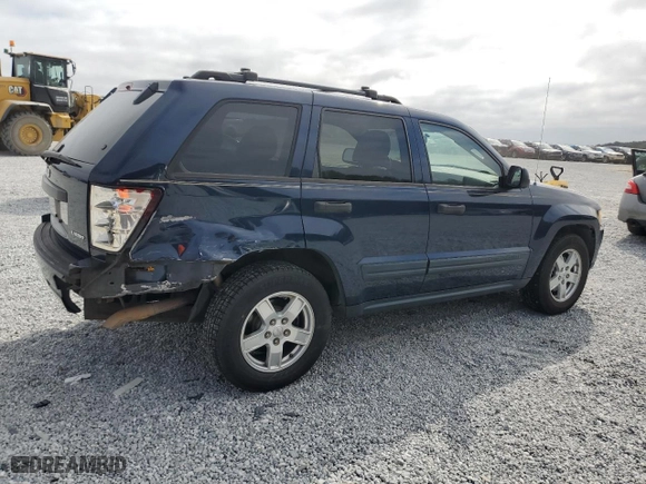 2005 Jeep Grand Cherokee Laredo with VIN 1J4HS48N75C724594, listed as a Copart auction lot 77941094 with 0 mi miles and Salvage Title. Bid and sale history available at carsss.com. Image 3.