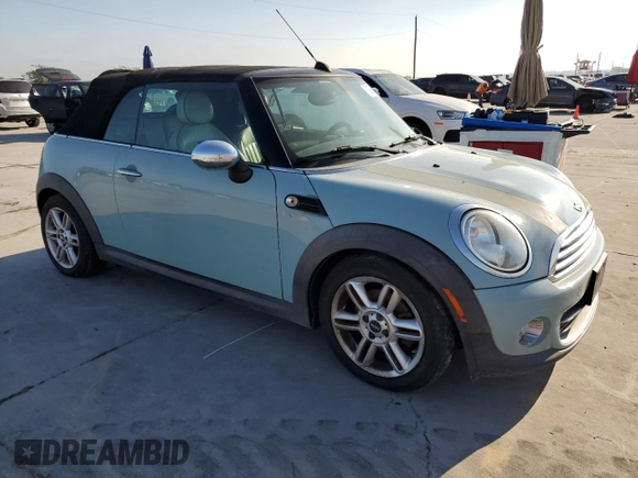 2013 MINI Convertible z VIN WMWZN3C57DT569379, wystawiony jako Copart lot #71982954 z przebiegiem 152 142 mil mil oraz Czysty tytuł • Clean title. Historia ofert i sprzedaży dostępna na DreamBid. Obrazek 4.