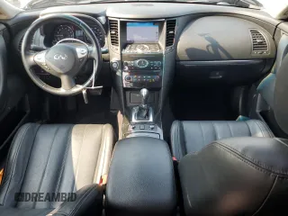 2014 Infiniti QX70 with VIN JN8CS1MW8EM411680, listed as a Copart auction lot 60350065 with 124,245 mi miles and Salvage title. Bid and sale history available at DreamBid. Image 8.