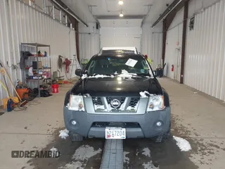 2005 Nissan Xterra S with VIN 5N1AN08U95C633157, listed as a IAAI auction lot 41277946 with 213,067 mi miles. Bid and sale history available at carsss.com. Image 12.